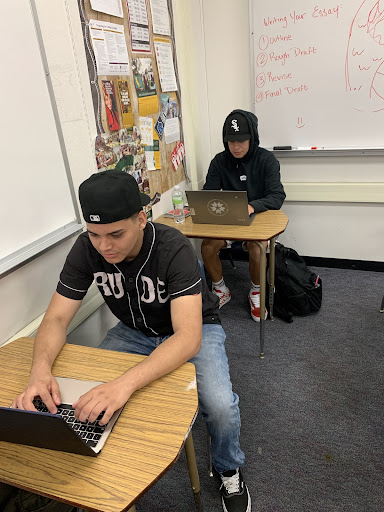 students work hard in class to improve grades