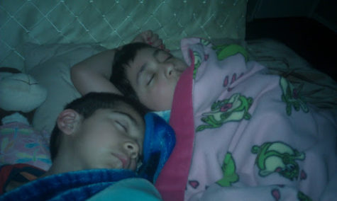 Diaz-Rivas and her brother taking a nap together