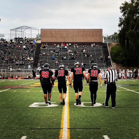 canyon hills football team stands together