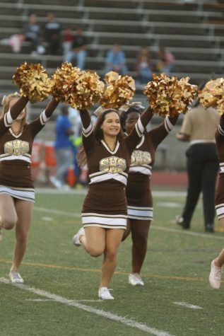 cheerleaders at football game