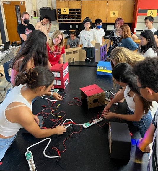 physics class builds town