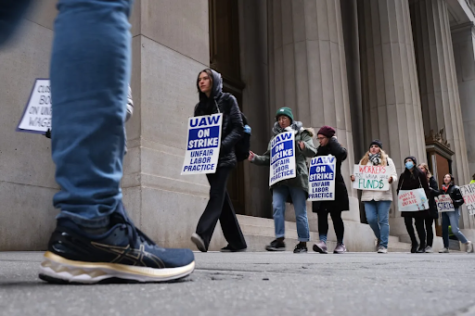 HarperCollins employees participating in a strike outside of the company’s Manhattan offices on November 15, 2022.