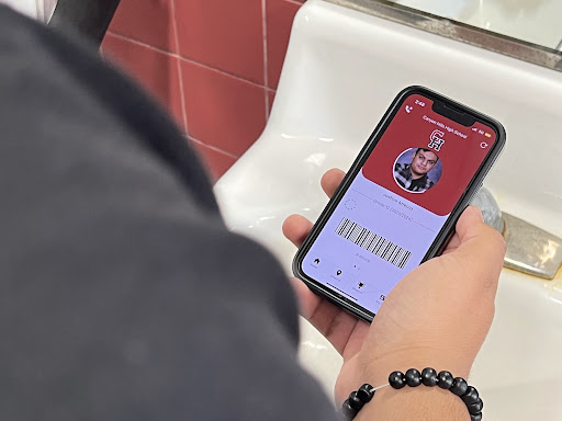Senior Joshua Arreola uses 5-Star Student app as pass so that he could use the restroom 
