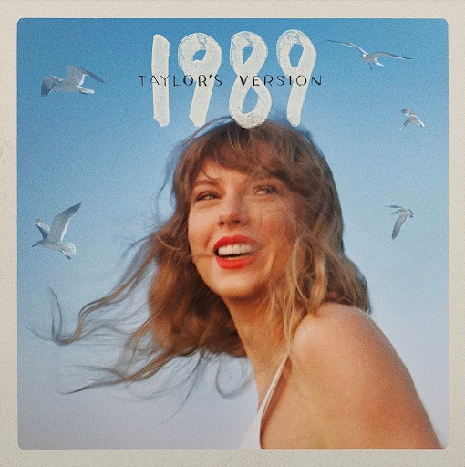 Taylor Swift kept the seagulls and handwritten “1989” features of the previous cover while also smiling amongst the sky to represent the album’s new ownership and maturity.
