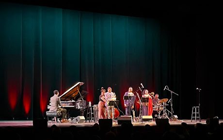 Milla Sgambelluri enjoys the Spirit of Mardi Gras band performing at the California Center for the Arts in Escondido